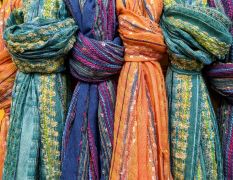 Add color, dimension, and  texture with our beautiful scarves.  Perfect for gifts!